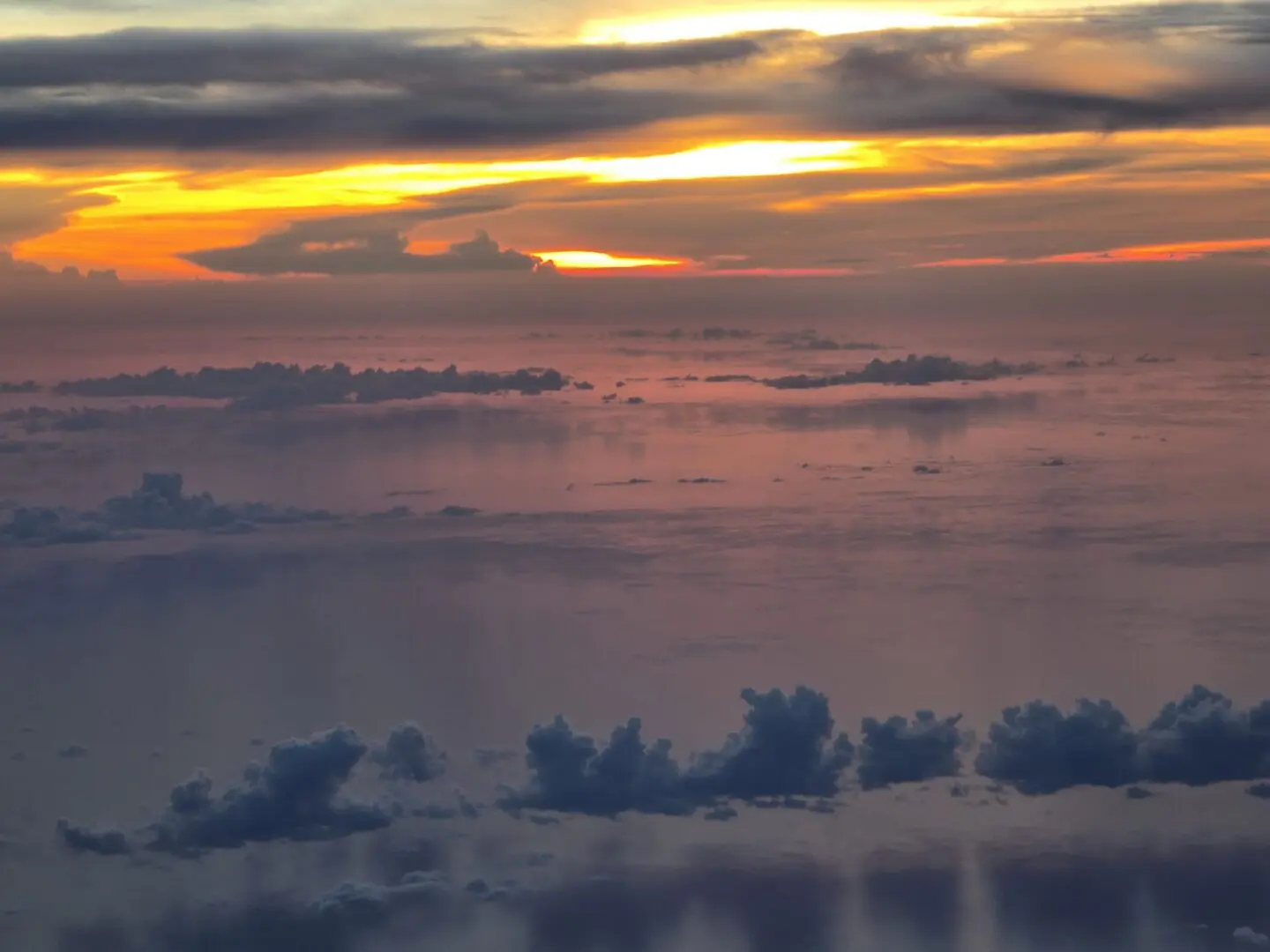Sunset over a sea of clouds